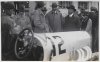 Fotografía del príncipe de Asturias y su hermano, el infante Jaime de Borbón, en Donostia-San Sebastián mirando el bólido Mercedes del piloto Giulio Masetti