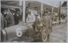 Fotografía del piloto Marcel Lehoux posando sobre su Bugatti y junto con el comisario Manuel Alcorta