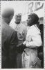 Fotografía de los pilotos de Alfa Romeo Louis Chiron y Tazio Nuvolari conversando